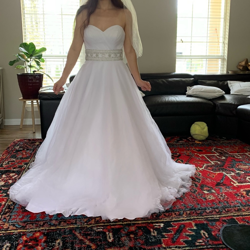 For Meg David’s Bridal OLeg Cassini Aline strapless corset wedding dress